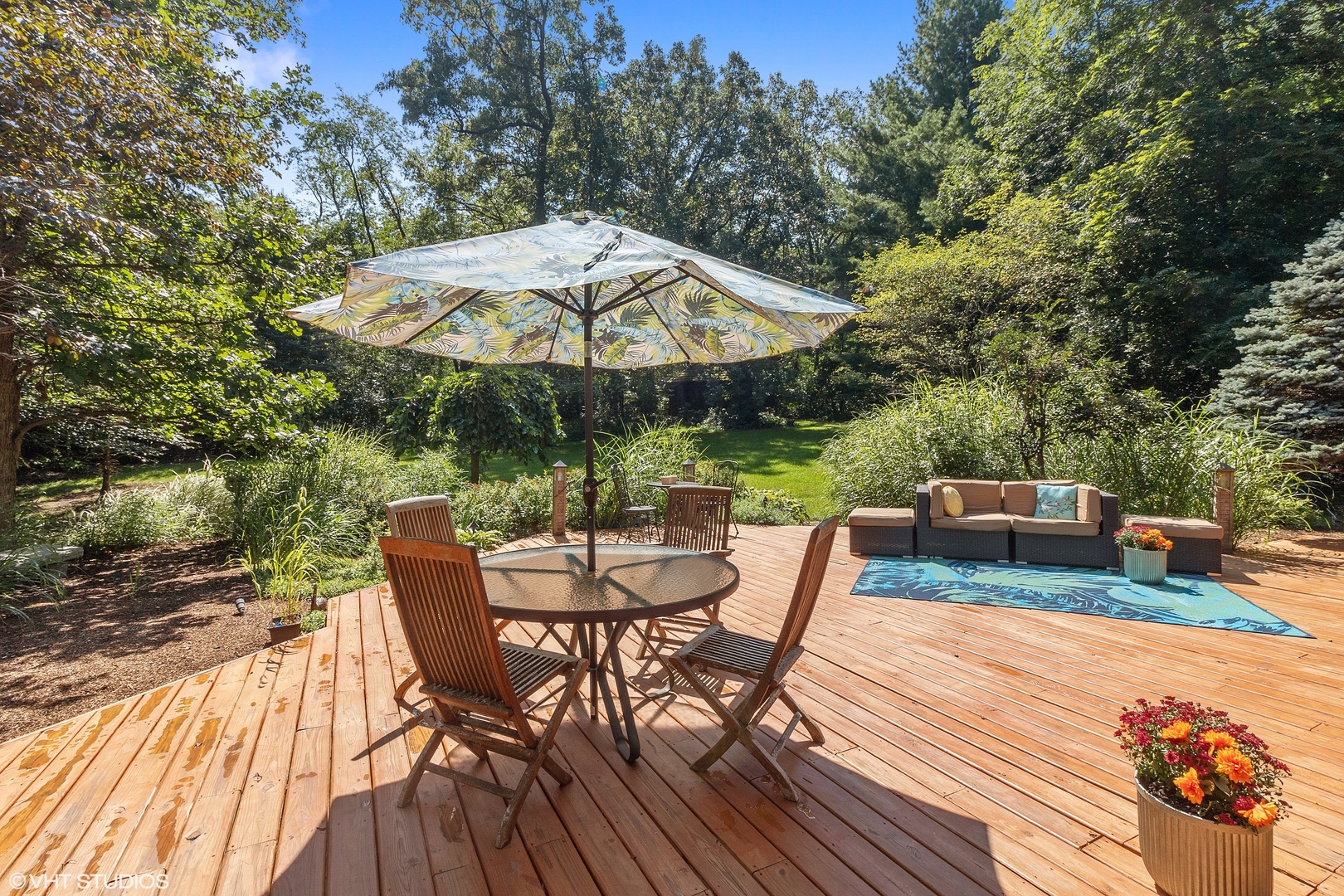 8309 Crystal Springs Road Bull Valley, IL 60098 - Photo 13 of 14 a view of backyard with seating space and trees