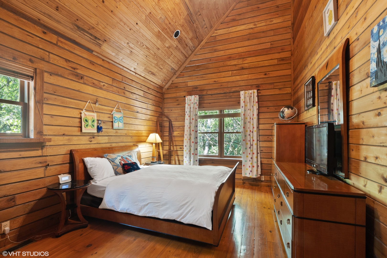 8309 Crystal Springs Road Bull Valley, IL 60098 - Photo 6 of 14 a spacious bedroom with a bed and large windows