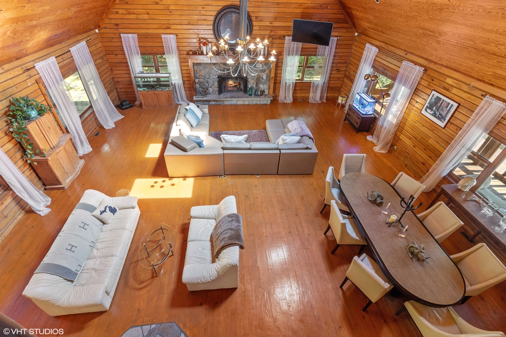 8309 Crystal Springs Road Bull Valley, IL 60098 - Photo 8 of 14 an aerial view of a work space with furniture and wooden floor