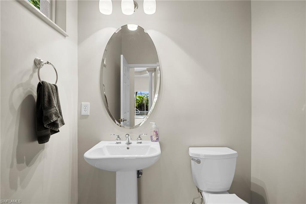 7915 Founders Circle Naples, FL 34104 - Photo 24 of 25 Bathroom with toilet