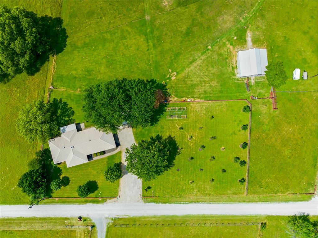 235 Magnus Road Denison, TX 75021 - Photo 10 of 35 an aerial view of a house with a yard