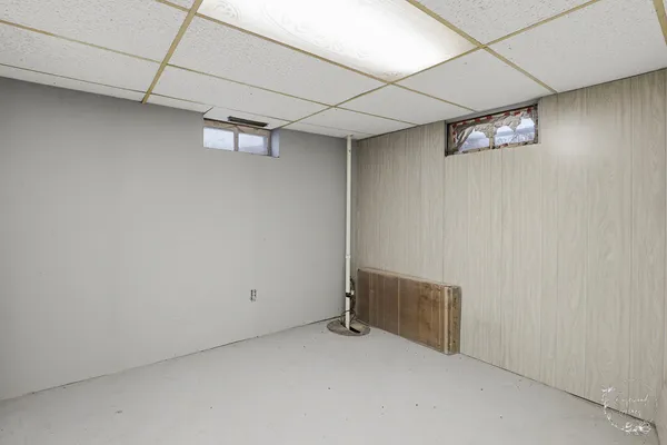 a view of a livingroom with hallway and hallway