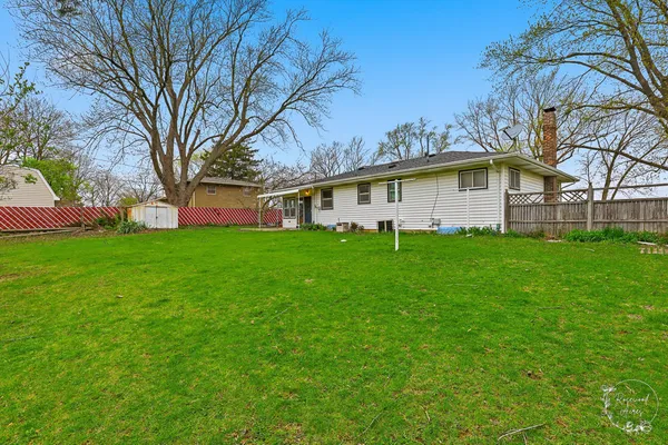 a house view with a garden space