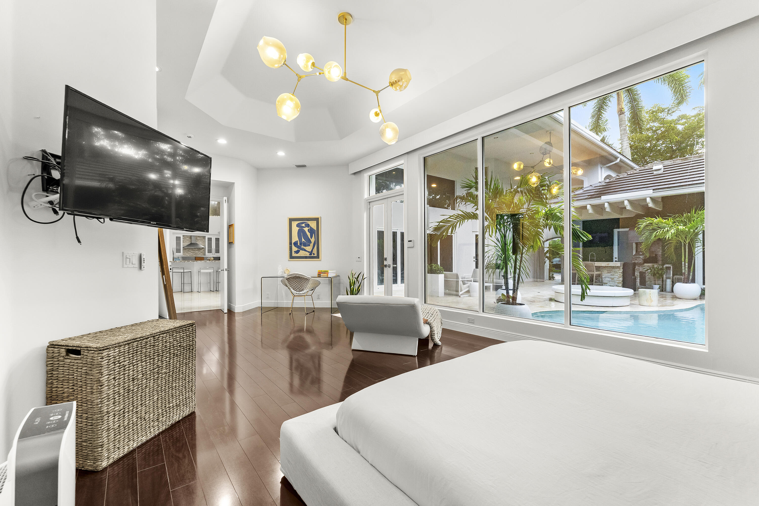 3156 Northwest 61st Street Boca Raton, FL 33496 - Photo 9 of 46 a living room with furniture and a flat screen tv