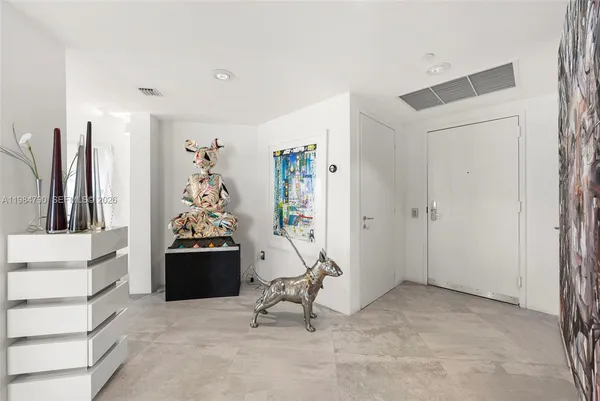 a view of a livingroom with furniture and a couch