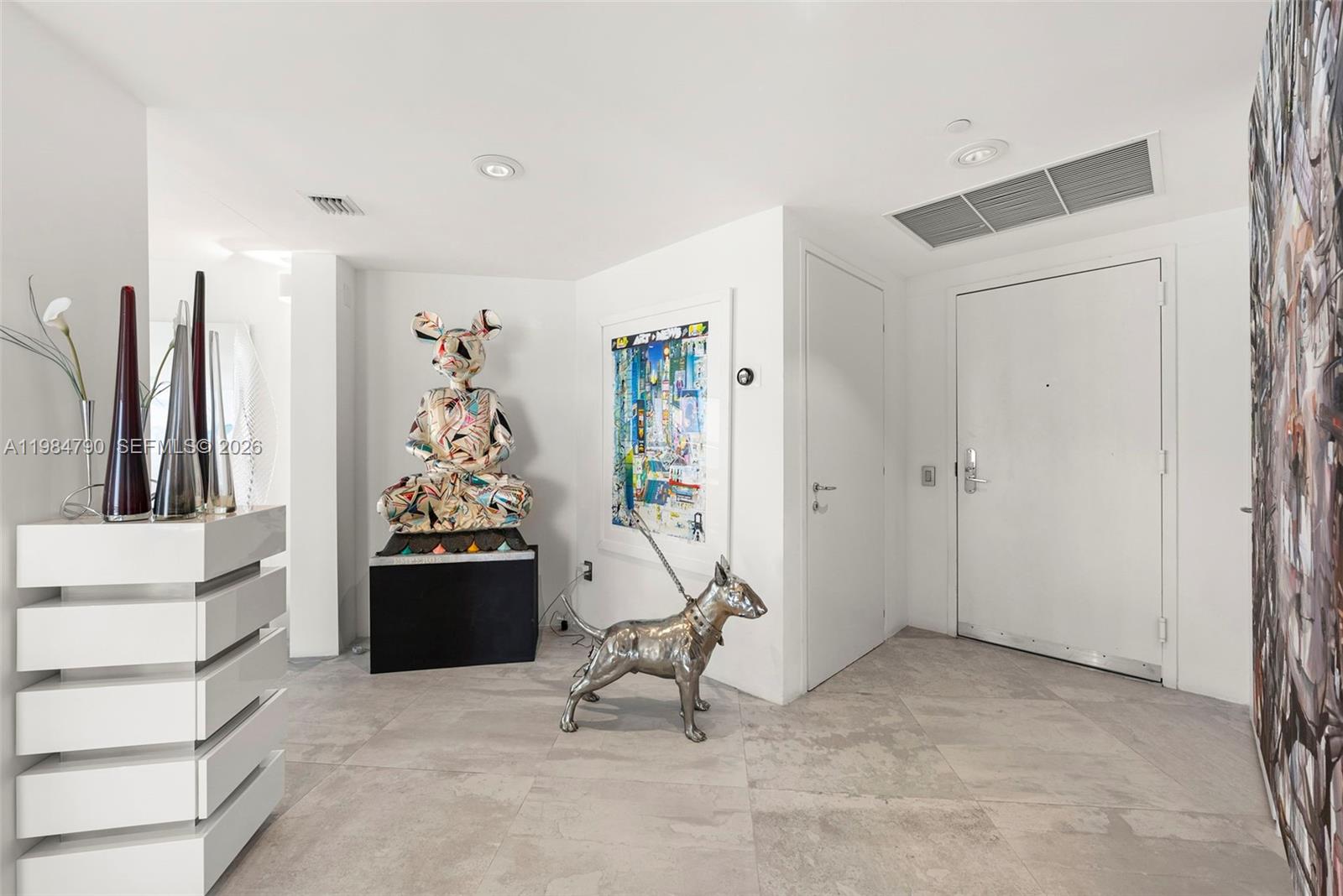 450 Alton Road, Unit 1507 Miami Beach, FL 33139 - Photo 15 of 72 a view of livingroom with furniture and a window