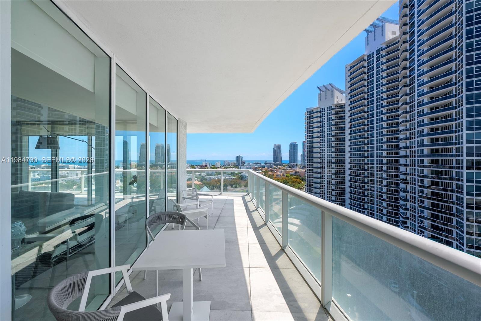 450 Alton Road, Unit 1507 Miami Beach, FL 33139 - Photo 5 of 72 a view of balcony with a potted plant