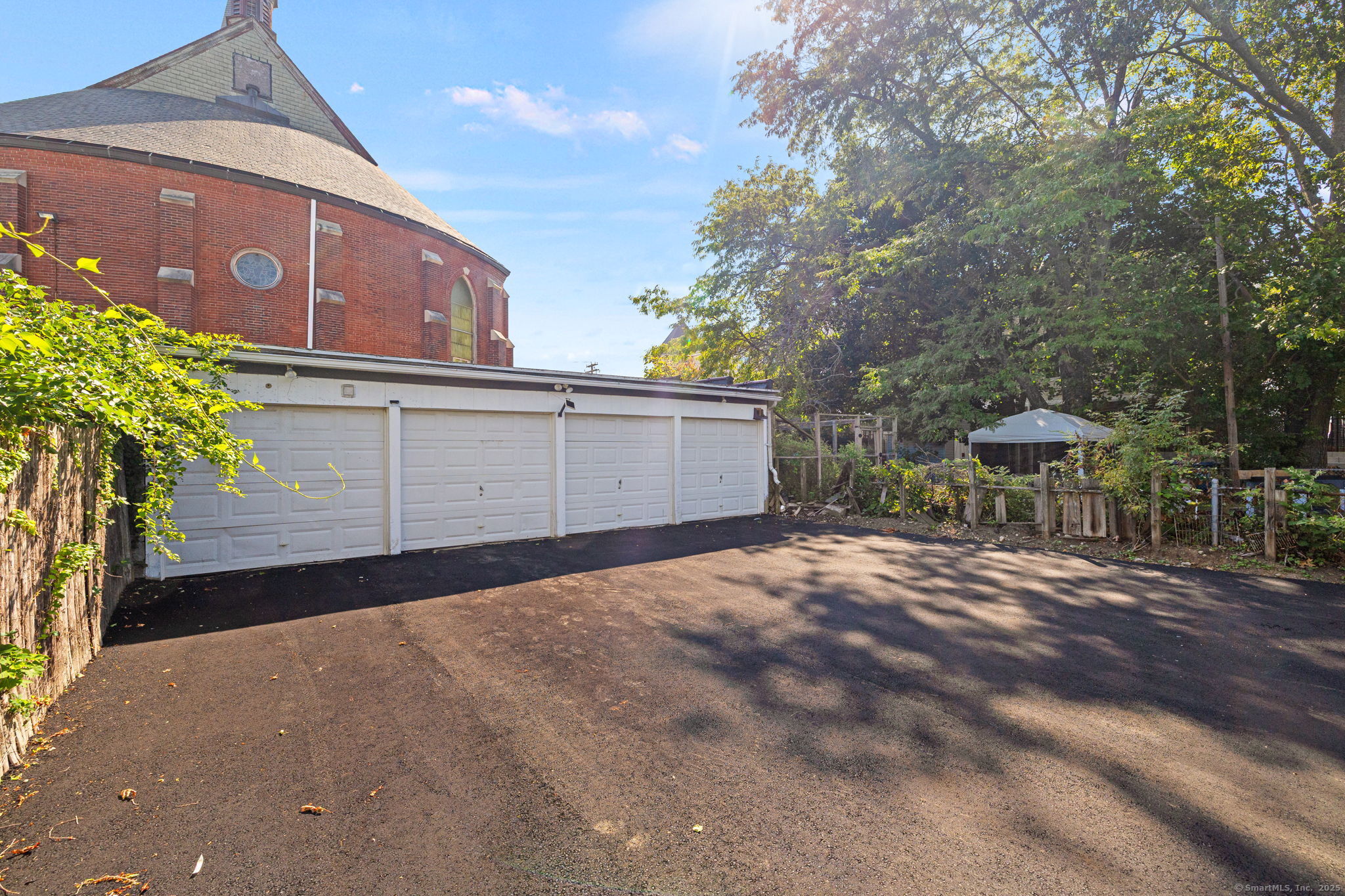 530 Jane Street, Unit 1 Bridgeport, CT 06608 - Photo 5 of 10 a view of a house with a garage