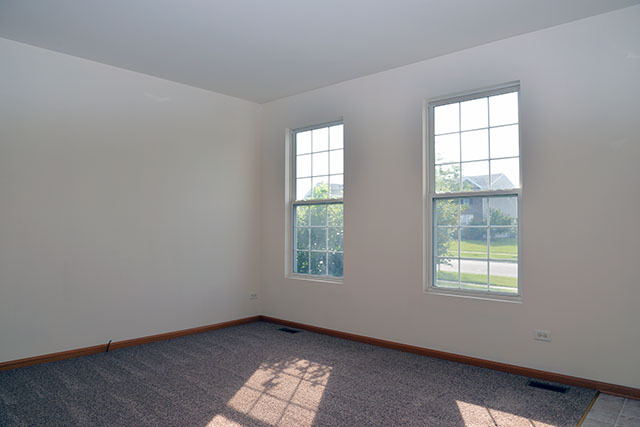 25148 Spring Street Manhattan, IL 60442 - Photo 14 of 15 an empty room with windows