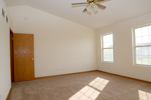 25148 Spring Street Manhattan, IL 60442 - Photo 9 of 15 a view of an empty room with a window