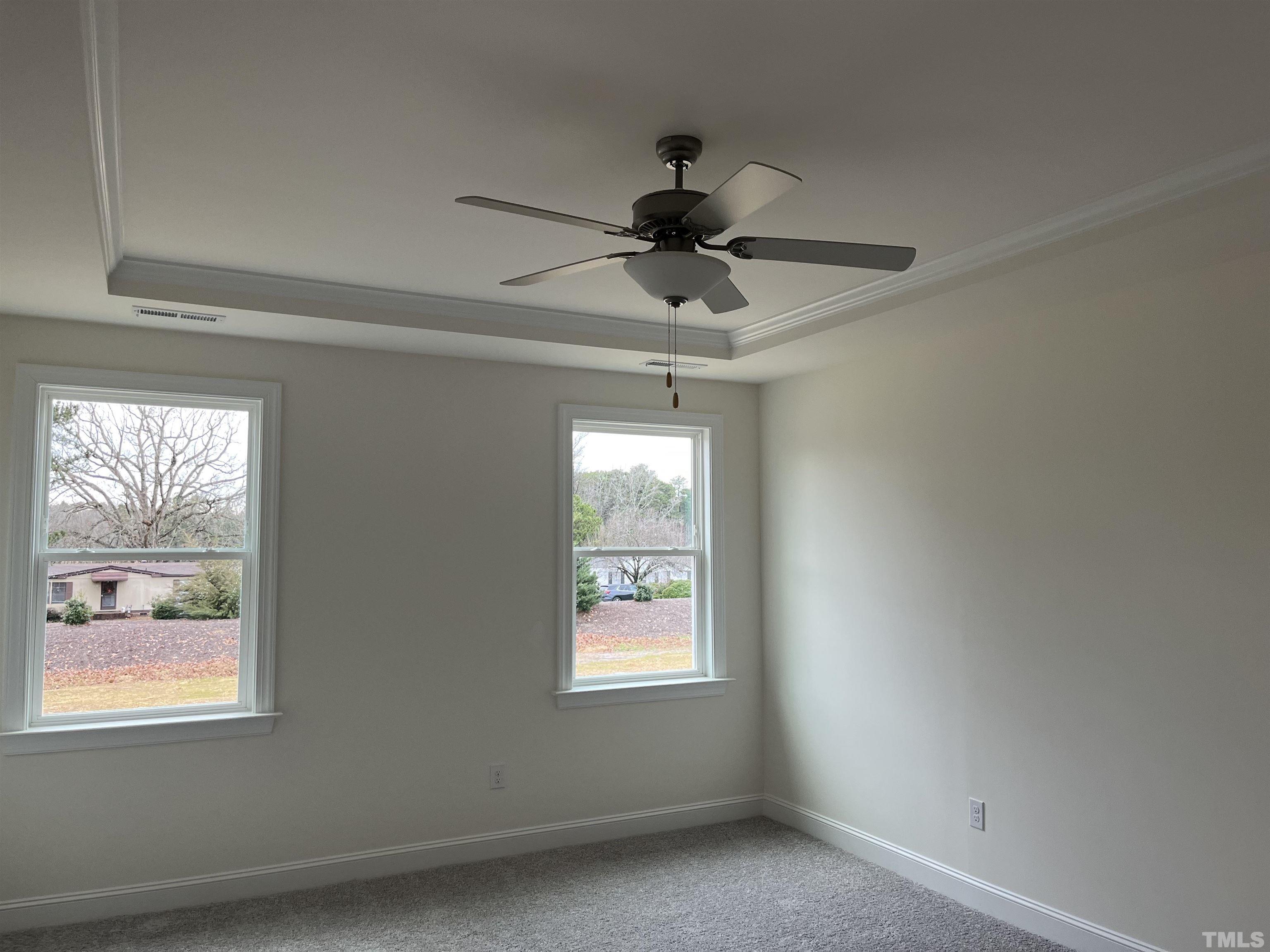 4408 Beckel Road Willow Spring, NC 27592 - Photo 10 of 24 a view of an empty room with a window