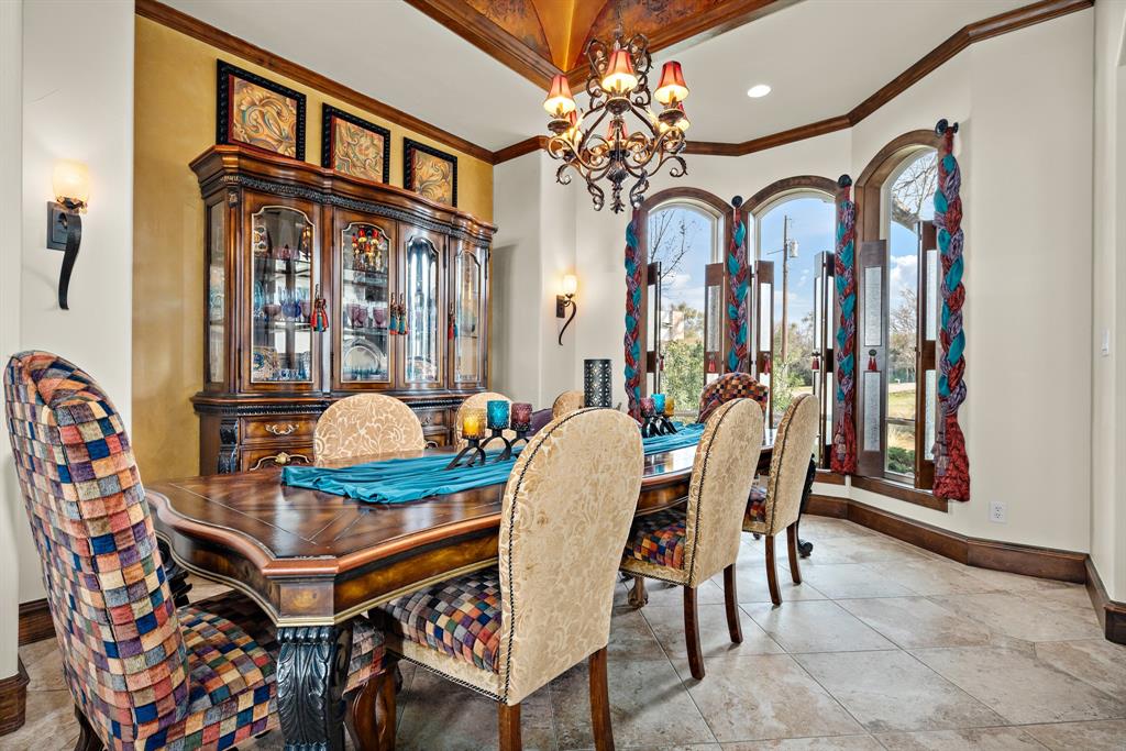 1252 Briar Court Whitney, TX 76692 - Photo 11 of 36 a view of a dining room with furniture and chandelier