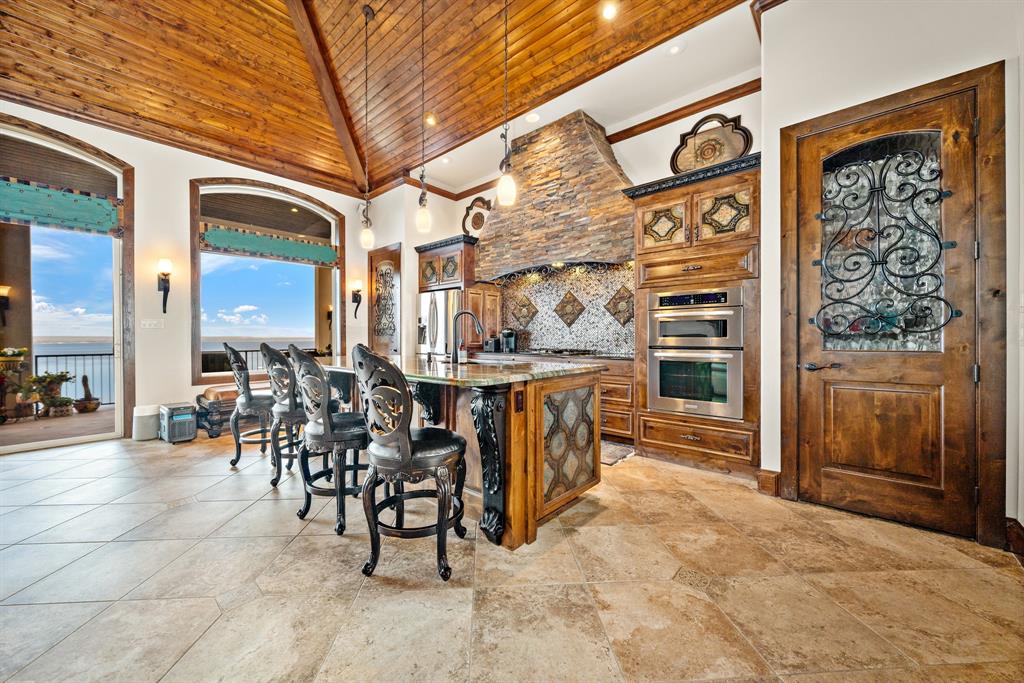 1252 Briar Court Whitney, TX 76692 - Photo 12 of 36 a view of a patio with dining table and chairs