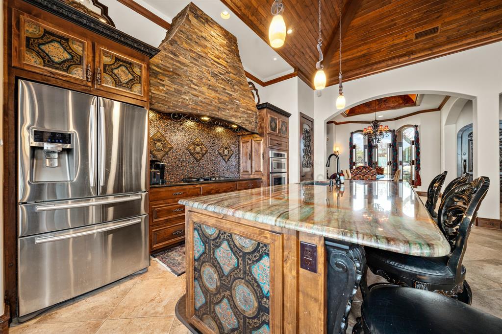1252 Briar Court Whitney, TX 76692 - Photo 13 of 36 a view of a patio with table and chairs