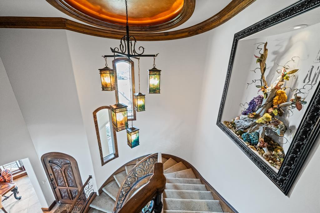 1252 Briar Court Whitney, TX 76692 - Photo 22 of 36 a view of a hallway with couches and painted walls