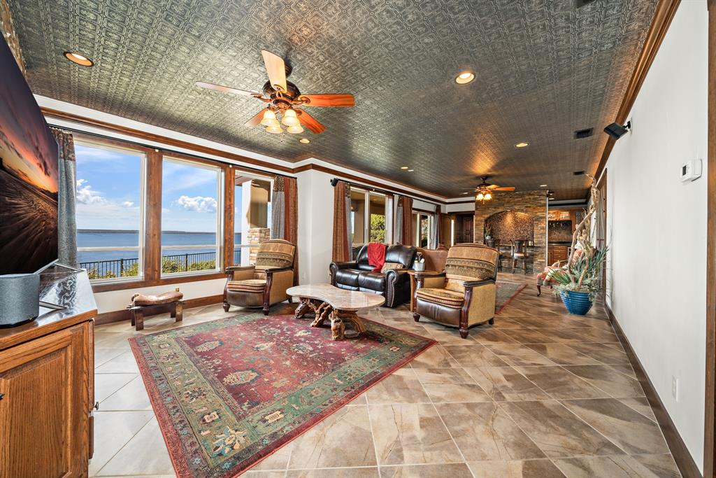 1252 Briar Court Whitney, TX 76692 - Photo 28 of 36 a living room with furniture and a large window