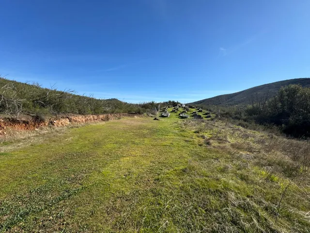 a view of mountain view with mountains in the background