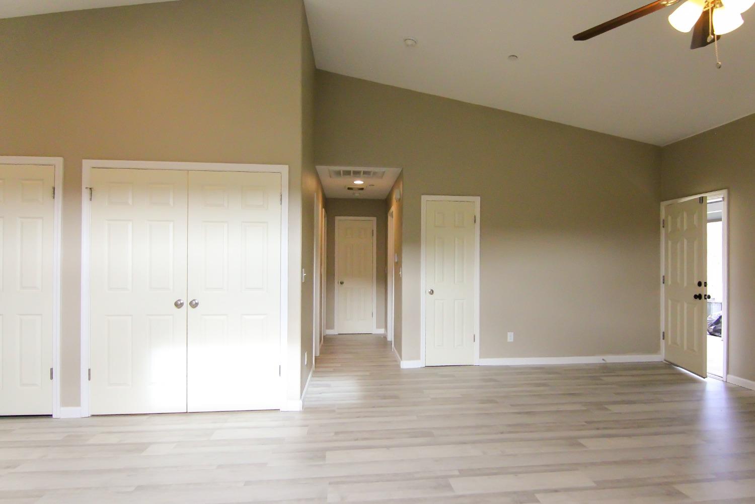4968 Yaqui Gulch Road Mariposa, CA 95338 - Photo 9 of 37 a view of a room with wooden floor