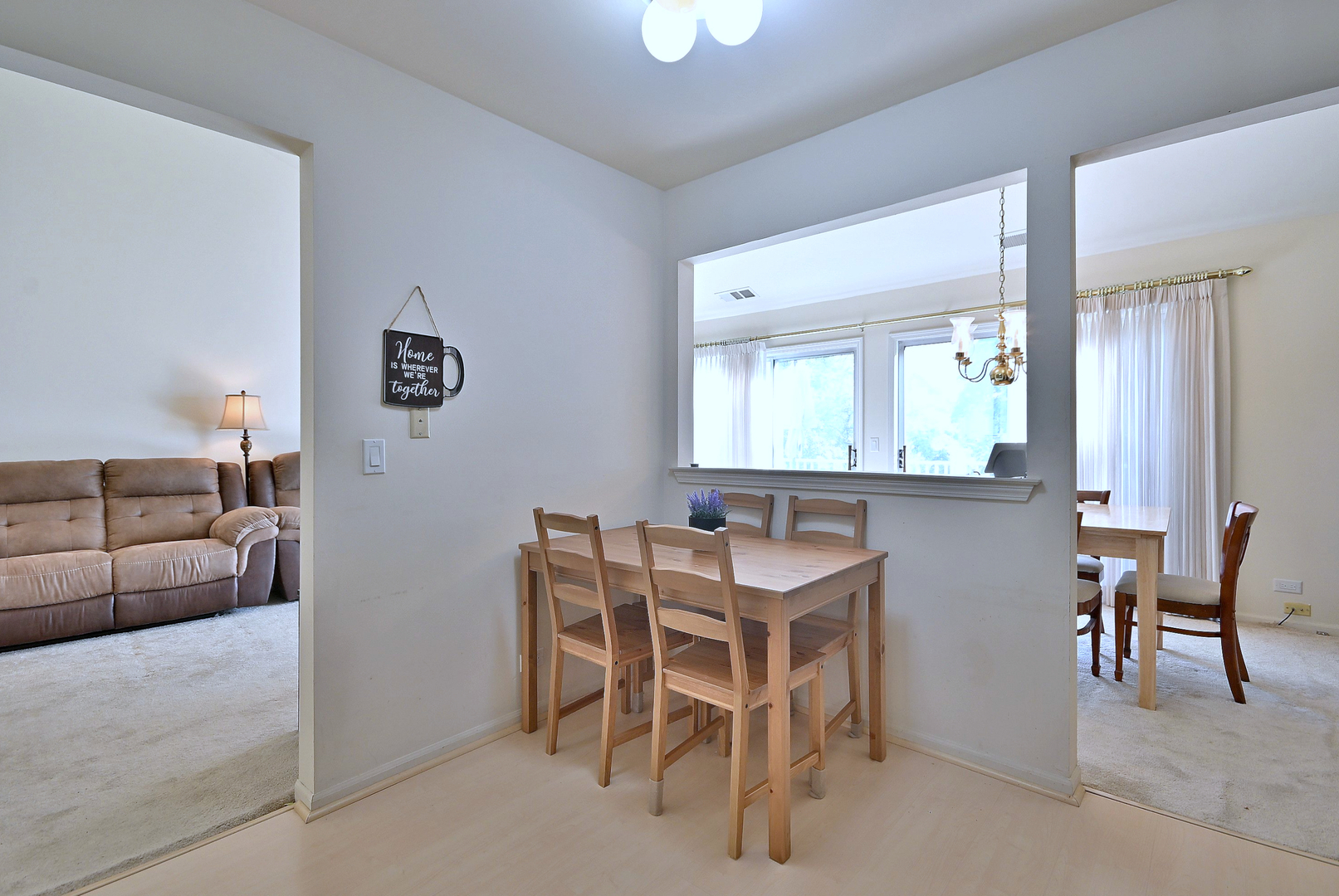 509 Aberdeen Lane, Unit C Prospect Heights, IL 60070 - Photo 14 of 27 a view of a livingroom with furniture and a couch
