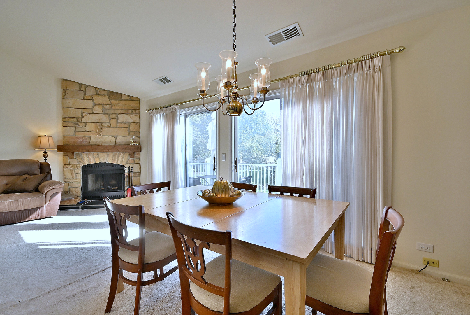 509 Aberdeen Lane, Unit C Prospect Heights, IL 60070 - Photo 10 of 27 a view of a dining room with furniture window and outside view