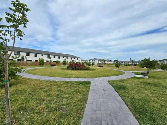 a view of a lake with a yard