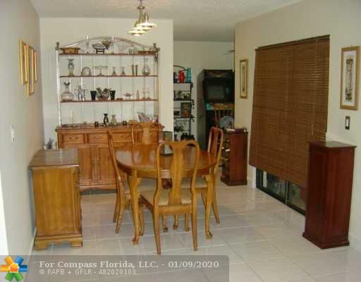 519 Racquet Club Road, Unit 51 Weston, FL 33326 - Photo 3 of 8 Dining Room