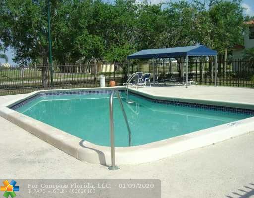 519 Racquet Club Road, Unit 51 Weston, FL 33326 - Photo 6 of 8 Swimming Pool/Hot Tub/Sauna