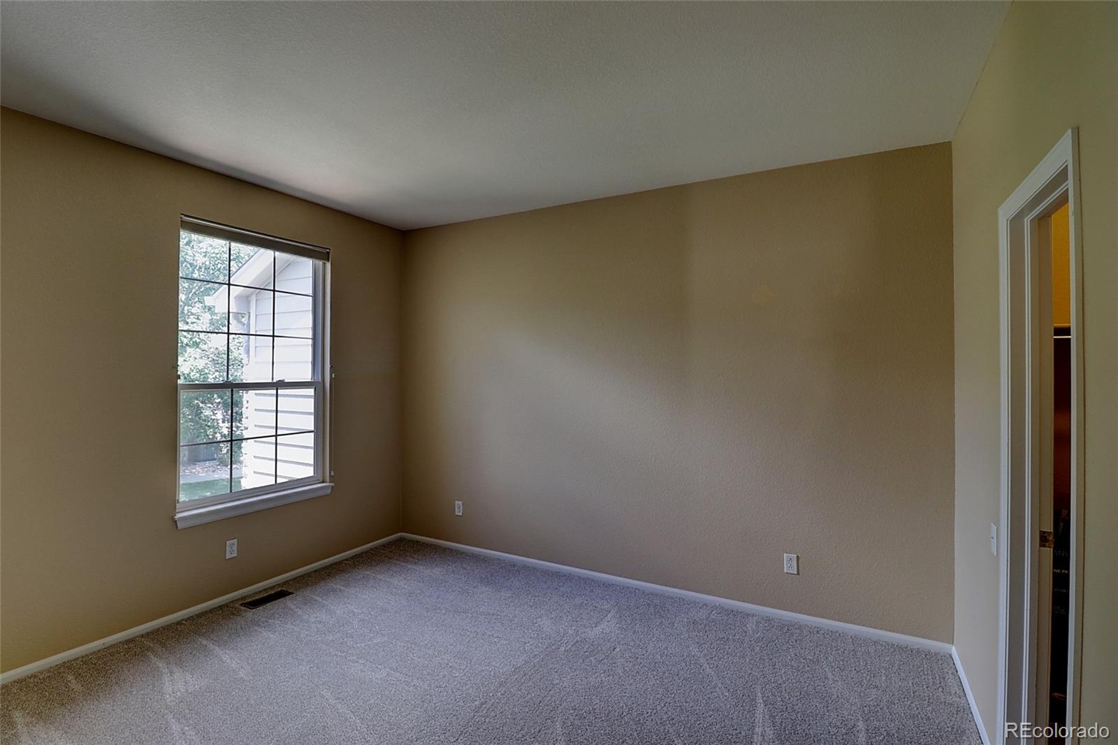 6203 Trailhead Road Highlands Ranch, CO 80130 - Photo 16 of 32 an empty room with windows