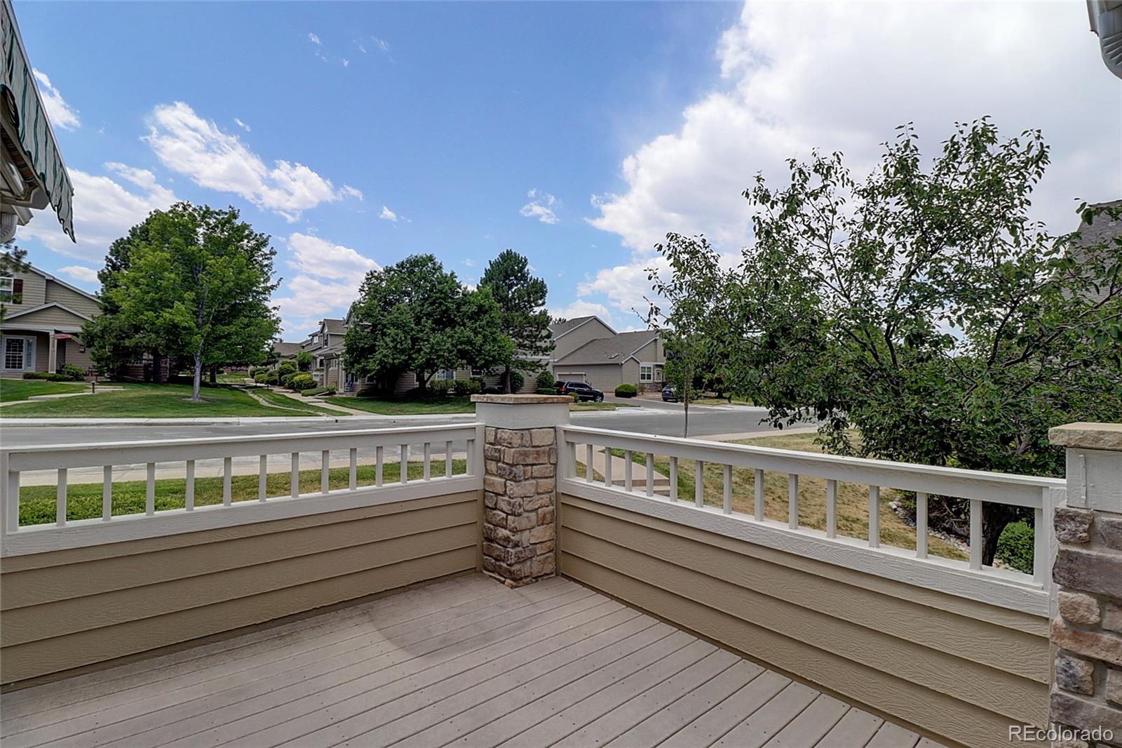 6203 Trailhead Road Highlands Ranch, CO 80130 - Photo 30 of 32 a view of a balcony with two chairs