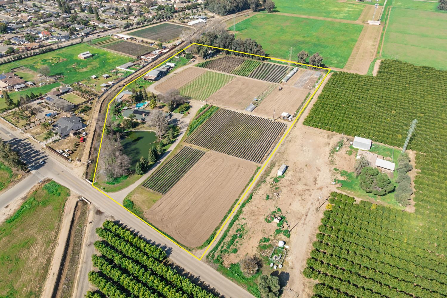 7176 East Butler Avenue Fresno, CA 93737 - Photo 2 of 76 an aerial view of a backyard