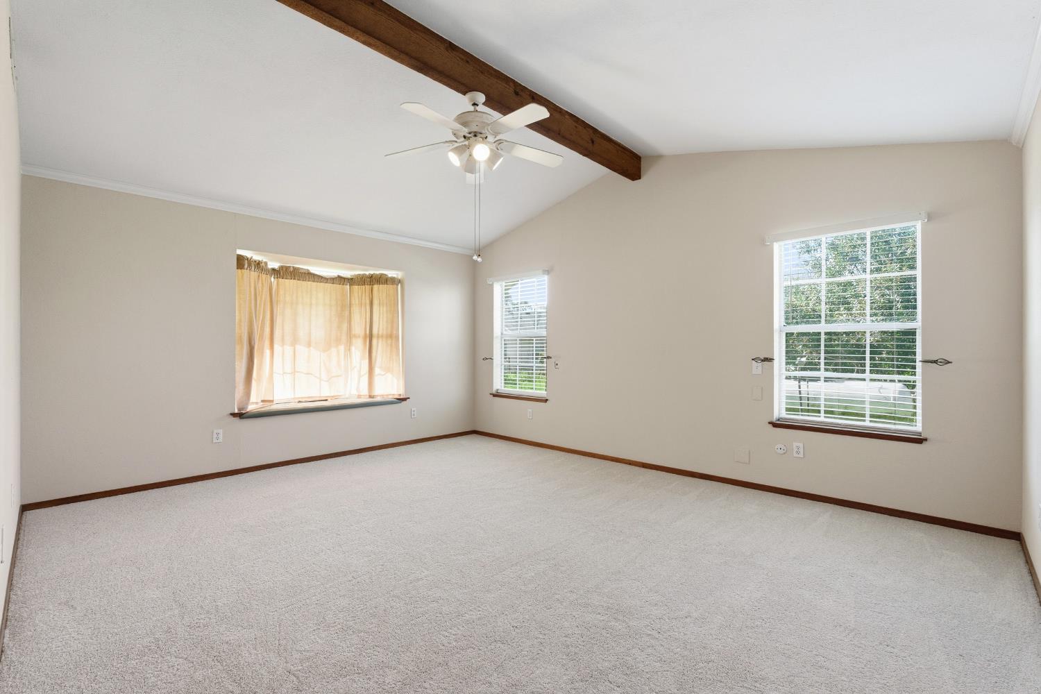 7176 East Butler Avenue Fresno, CA 93737 - Photo 32 of 76 an empty room with windows and closet