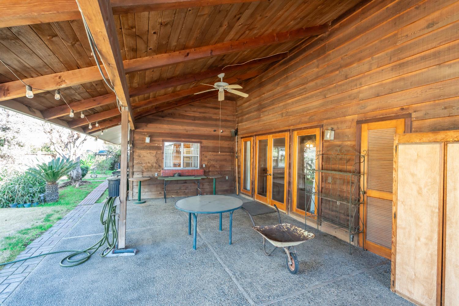 7176 East Butler Avenue Fresno, CA 93737 - Photo 45 of 76 a outdoor space with patio lots of furniture and tub