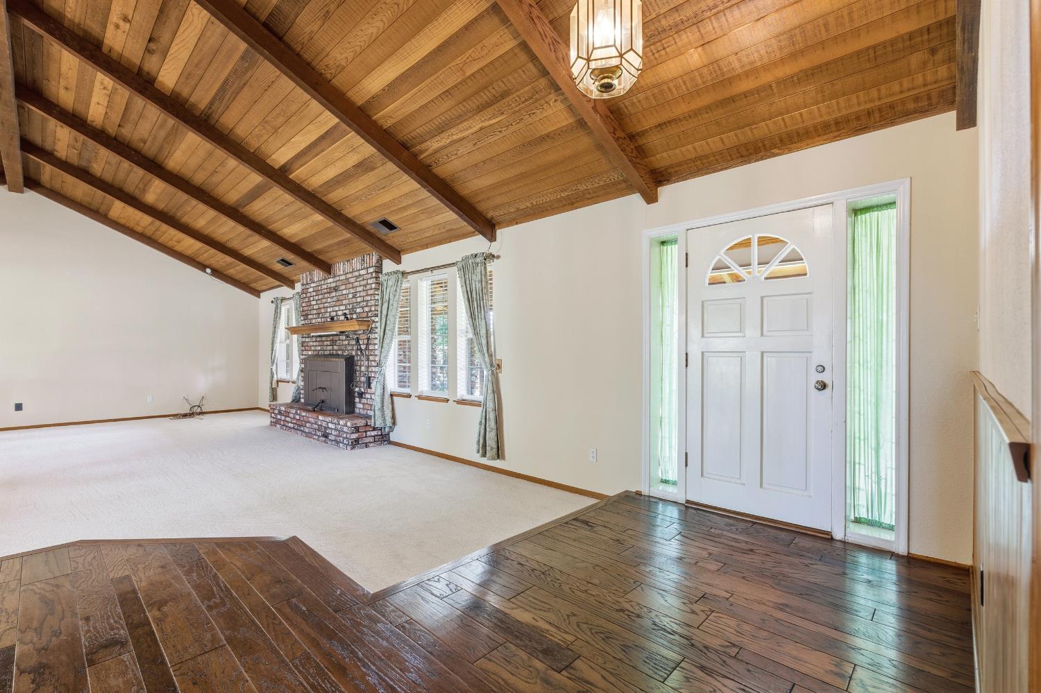 7176 East Butler Avenue Fresno, CA 93737 - Photo 7 of 76 a view of empty room with wooden floor