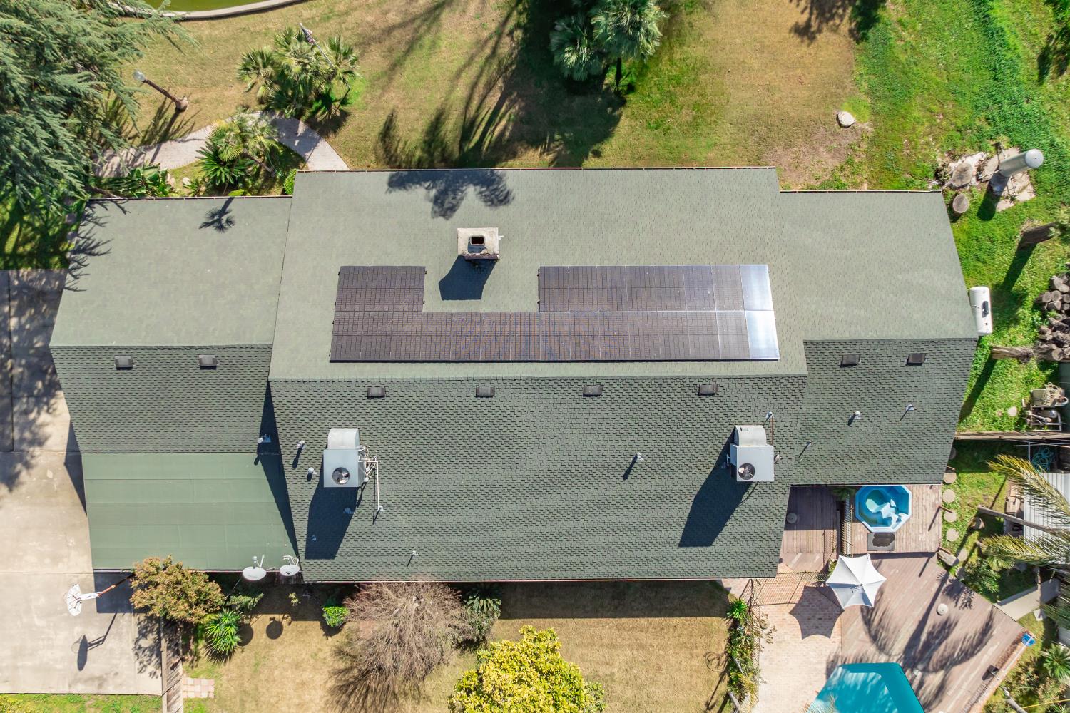 7176 East Butler Avenue Fresno, CA 93737 - Photo 71 of 76 an aerial view of a house with a yard