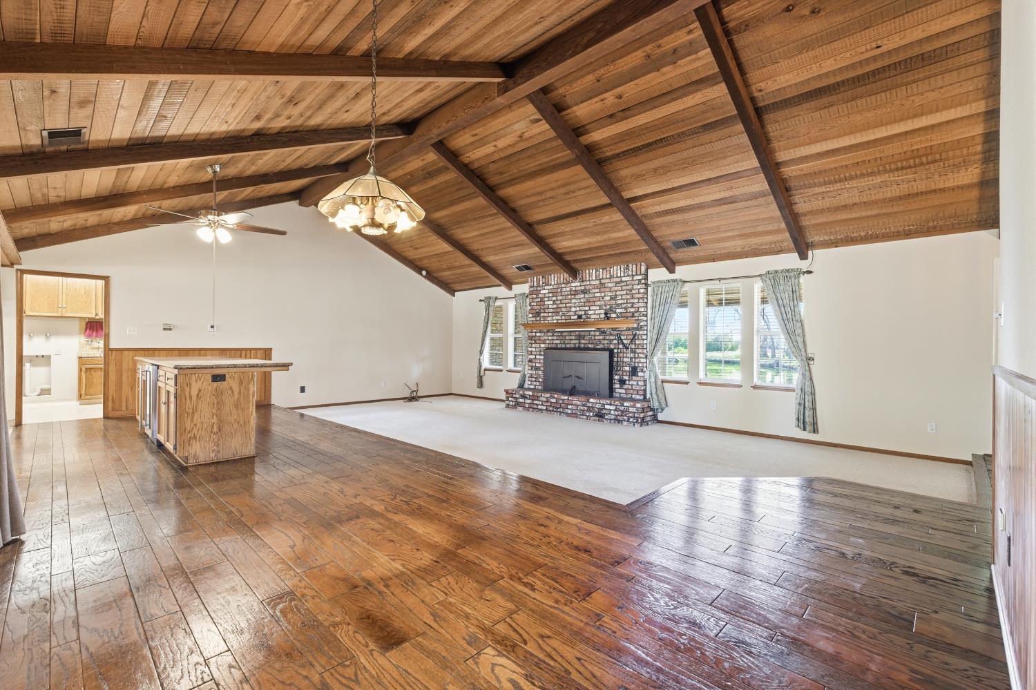 7176 East Butler Avenue Fresno, CA 93737 - Photo 8 of 76 a view of empty room with wooden floor
