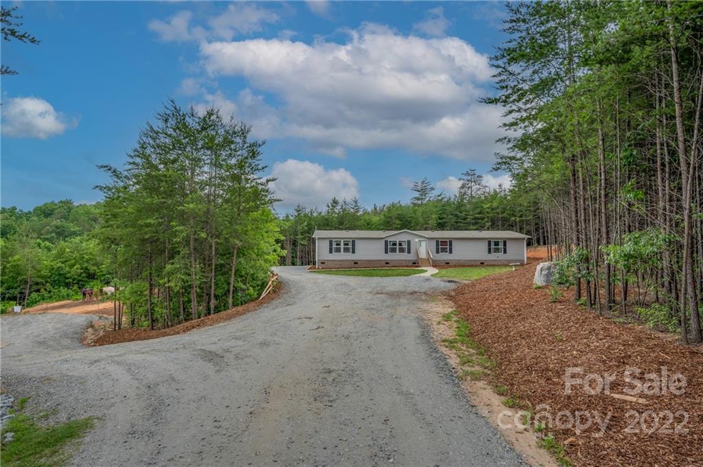 628 Hamilton Road Rutherfordton, NC 28139 - Photo 1 of 35 a view of a swimming pool with a yard