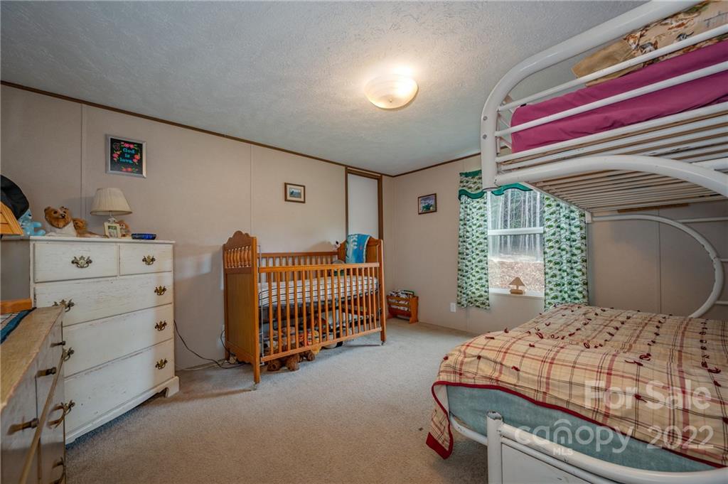628 Hamilton Road Rutherfordton, NC 28139 - Photo 29 of 35 a bedroom with a bed and a window