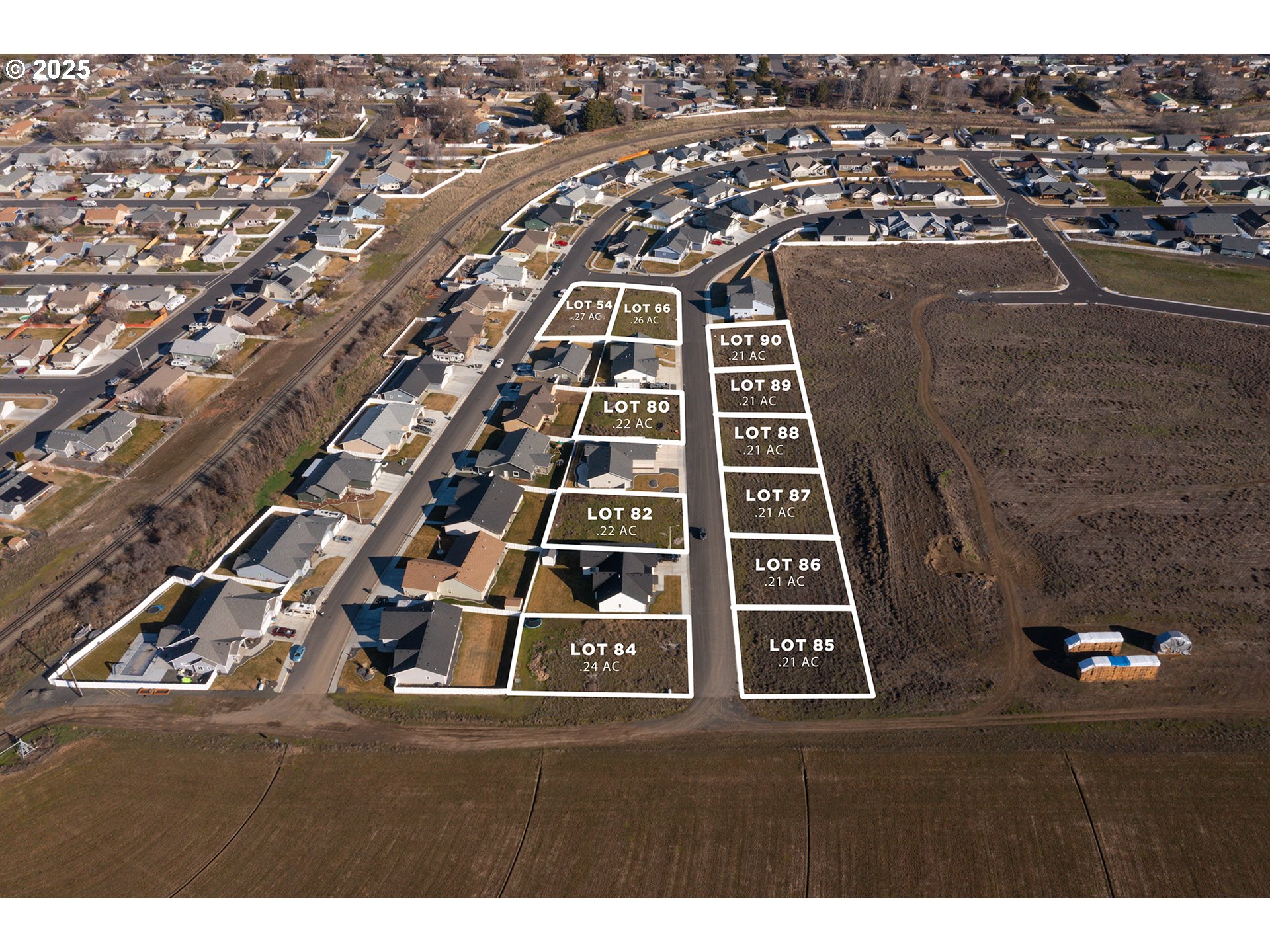 573 Southwest Desert Sky Drive, Unit 89 Hermiston, OR 97838 - Photo 1 of 8 an aerial view of a city