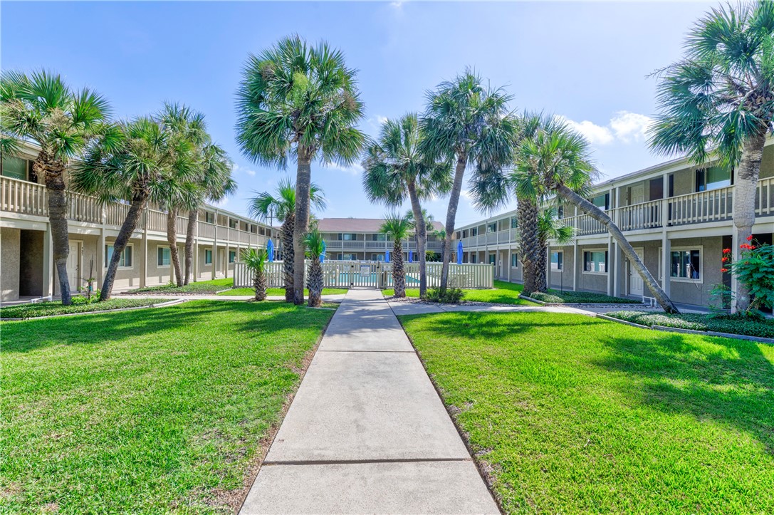 622 Beach Access Rd- 1a, Unit 231 Port Aransas, TX 78373 - Photo 24 of 24 a view of a yard with palm trees