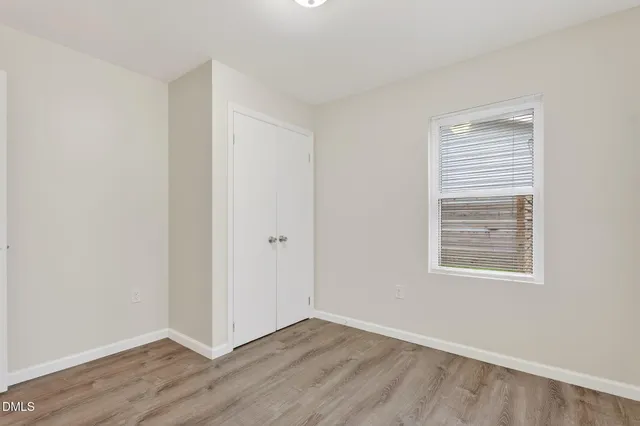 a kitchen with stainless steel appliances a sink stove and refrigerator