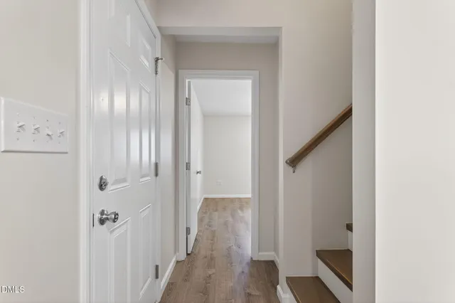 a bathroom with a sink toilet a mirror and shower