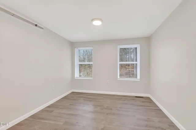 a kitchen with stainless steel appliances a sink and a stove