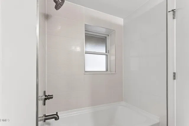 a view of a balcony with wooden floor