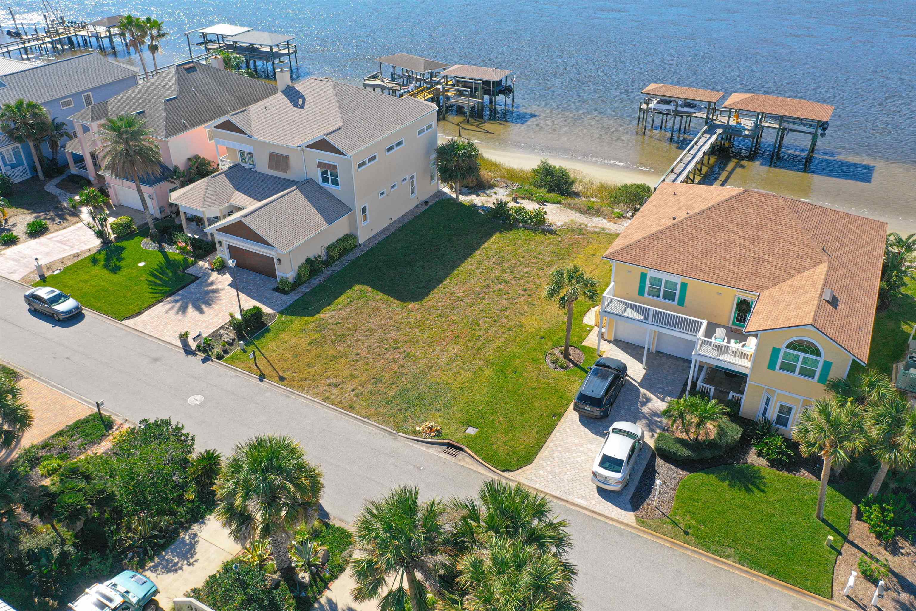 9241 July Lane St. Augustine, FL 32080 - Photo 11 of 18 an aerial view of a house with garden space and street view