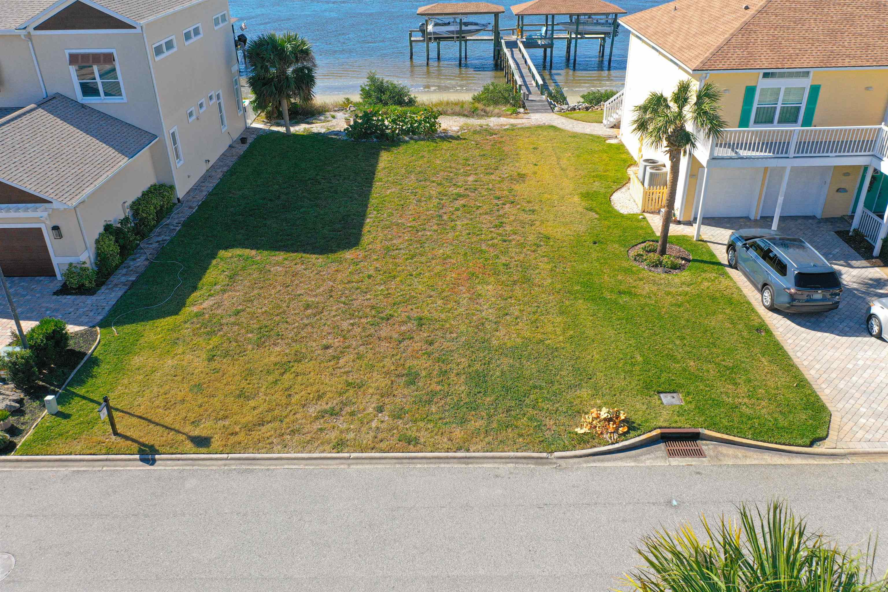 9241 July Lane St. Augustine, FL 32080 - Photo 12 of 18 an aerial view of a swimming pool