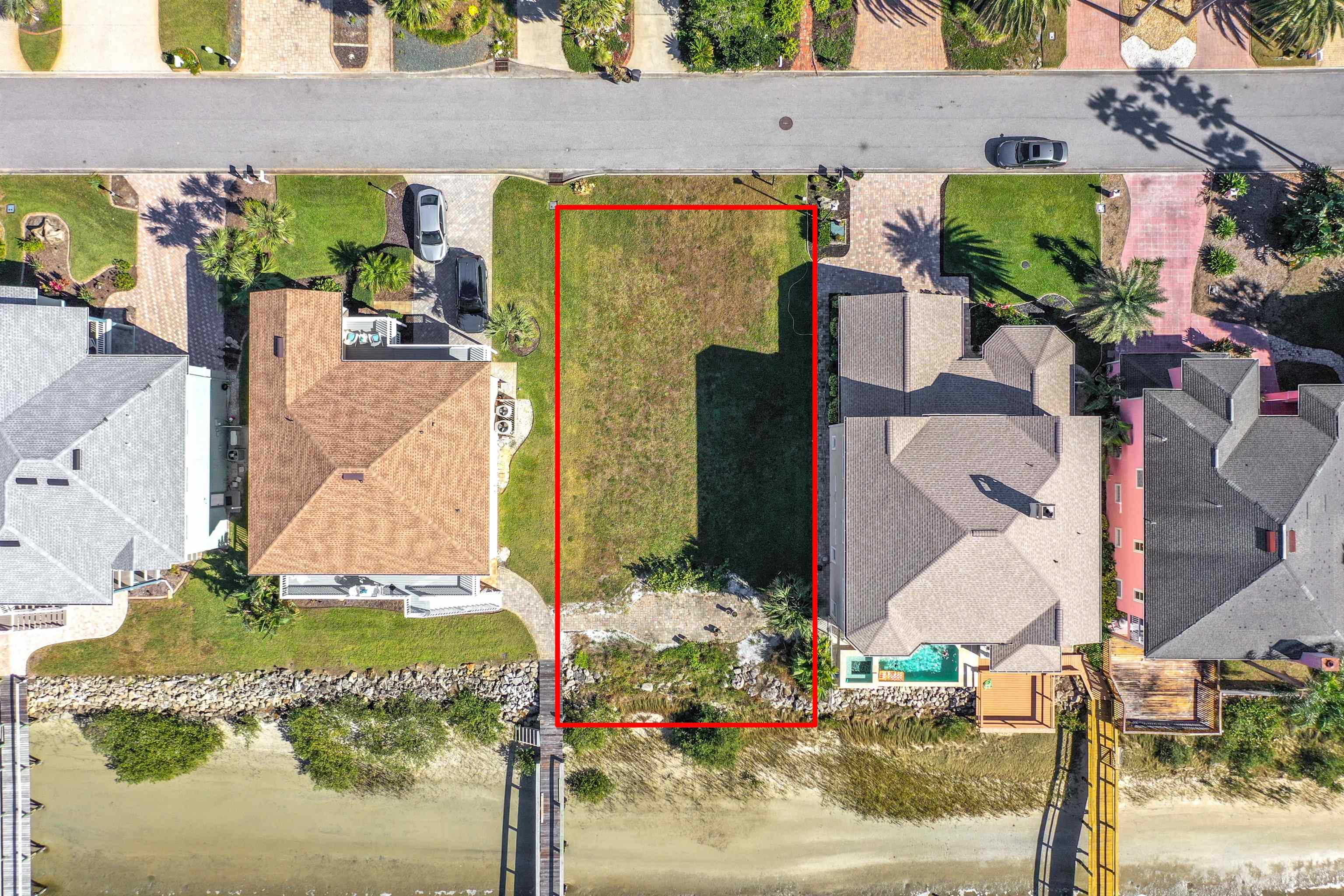 9241 July Lane St. Augustine, FL 32080 - Photo 16 of 18 front view of a house with a street