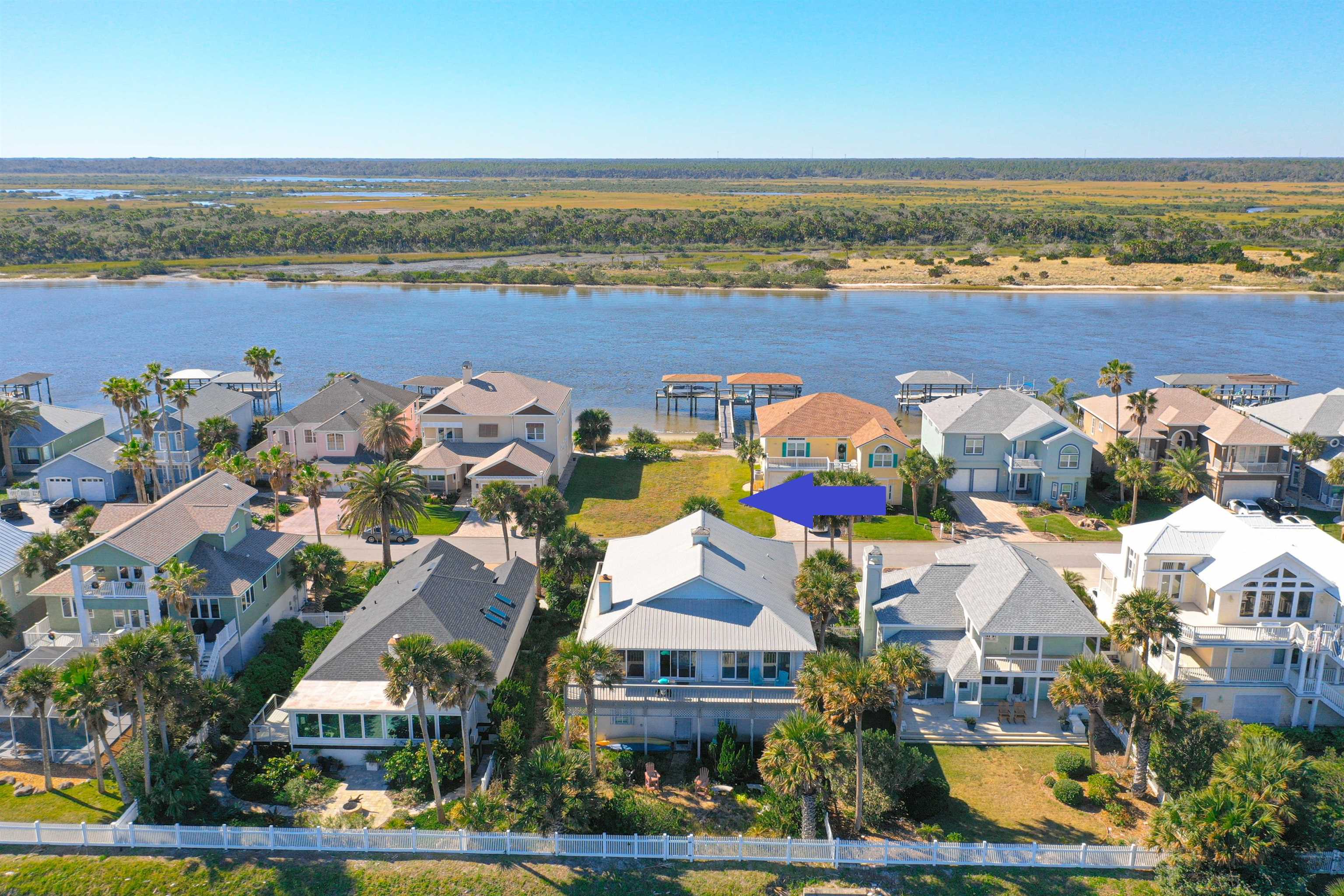 9241 July Lane St. Augustine, FL 32080 - Photo 6 of 18 an aerial view of residential building and lake