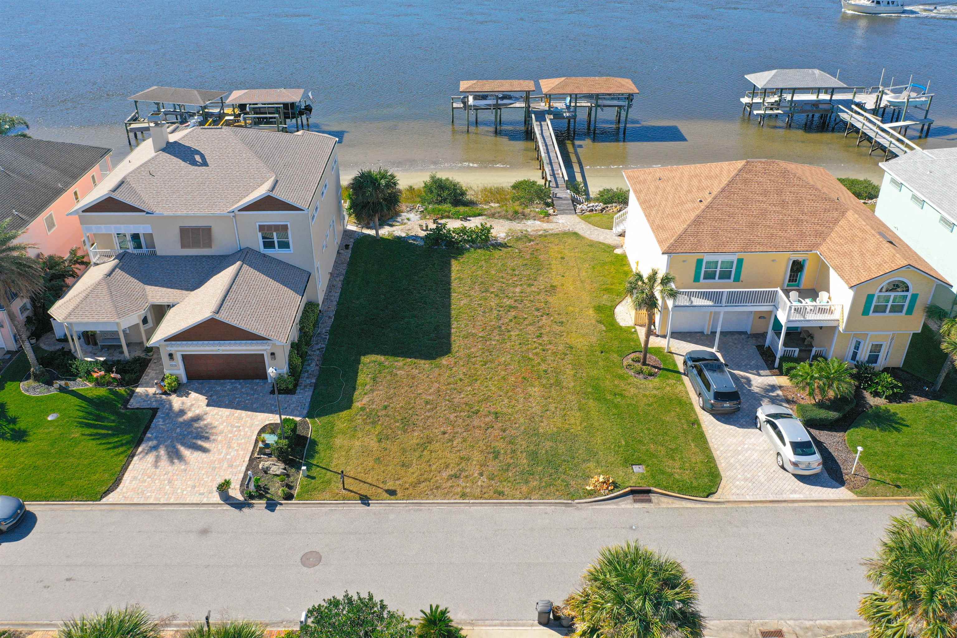 9241 July Lane St. Augustine, FL 32080 - Photo 9 of 18 an aerial view of a house with a swimming pool