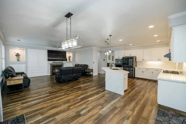 a bathroom with a double vanity sink and mirror