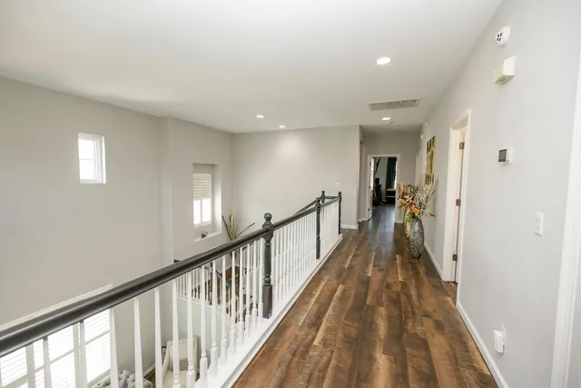 a view of a house with backyard and porch
